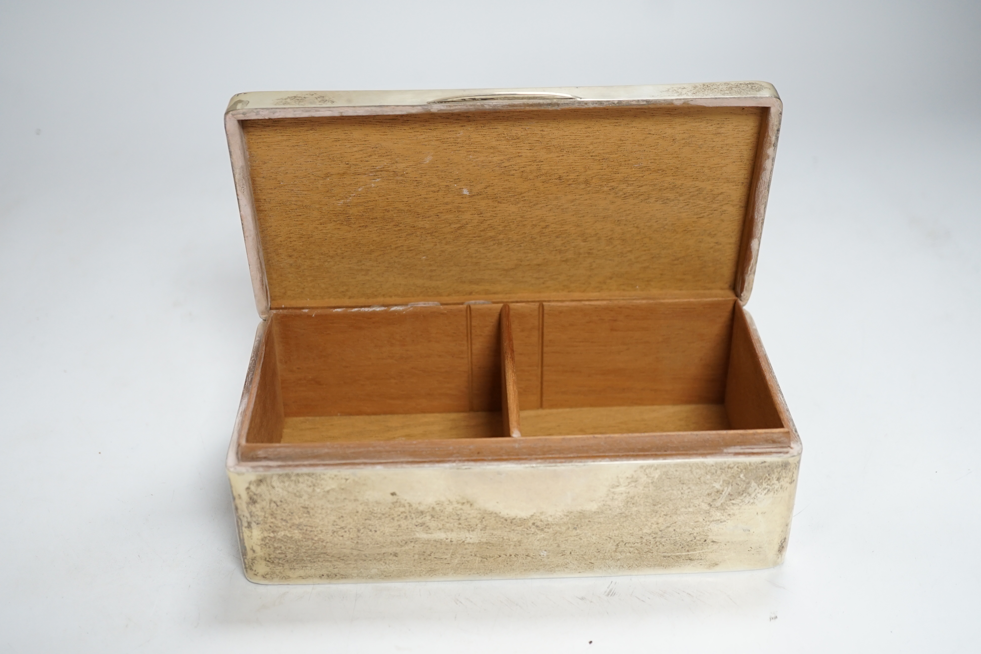 A George V Art Deco silver mounted rectangular cigarette box, Birmingham, 1930?, 17.5cm.